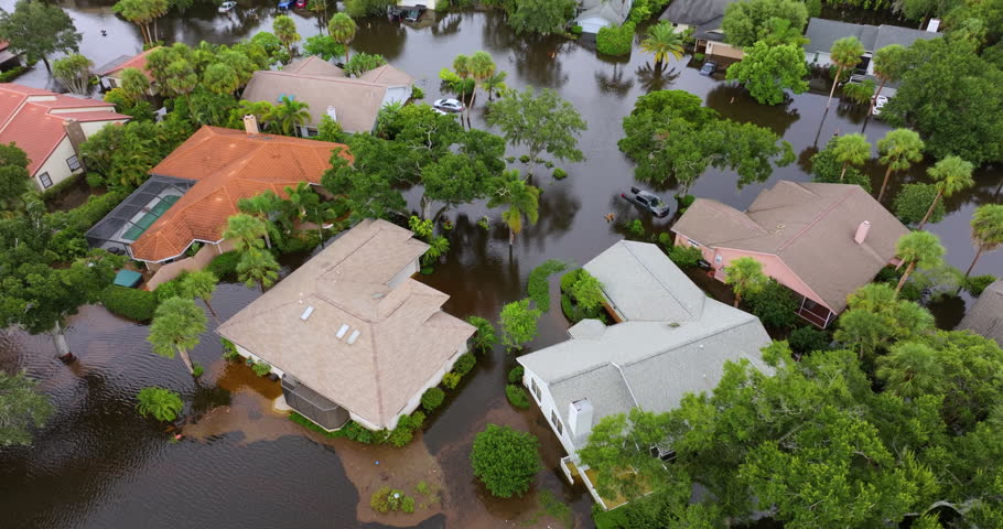 Hurricane flooded homes in residential community in Florida, USA. Aftermath of natural disaster.