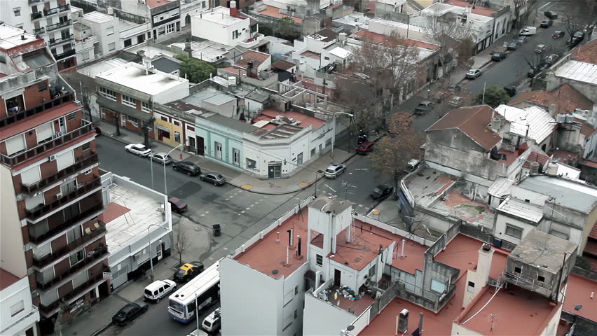 High Angle View Of Public City Bus Navigating Street Intersection in Buenos Aires, Argentina - 4K
