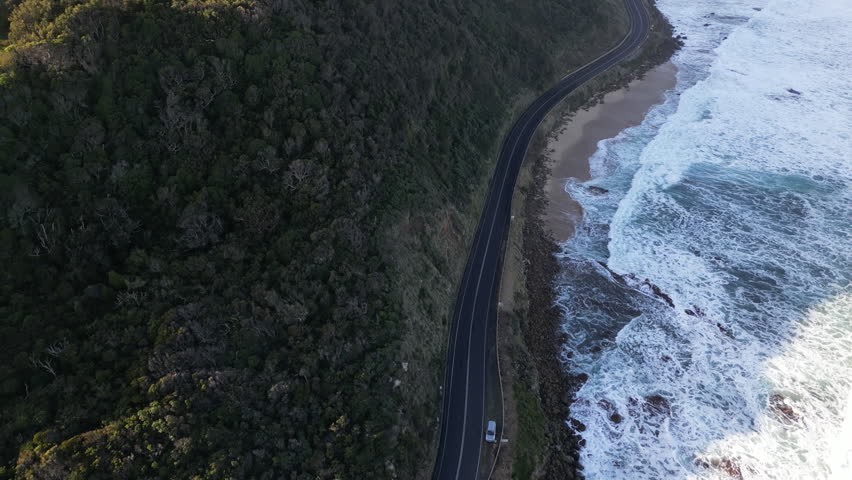 Aerial panorama of Great Ocean Road in Victoria Australia showcasing beautiful nature mountains rocky coastline and oceanfront highway