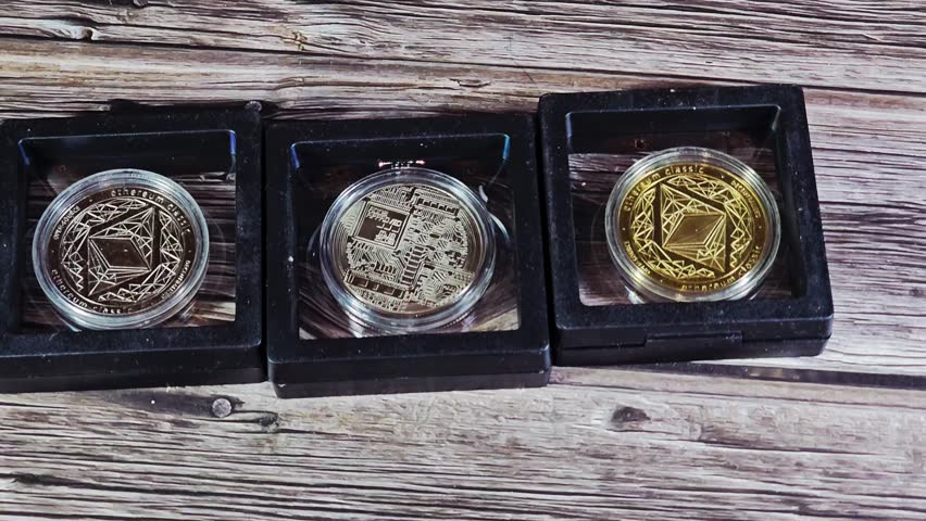 Three physical gold, silver Ethereum coins and silver bitcoin, Bitcoin (BTC) is the world