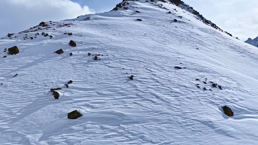 Snow-covered mountain slope in Nauders, Austria, scenic and peaceful winter landscape.