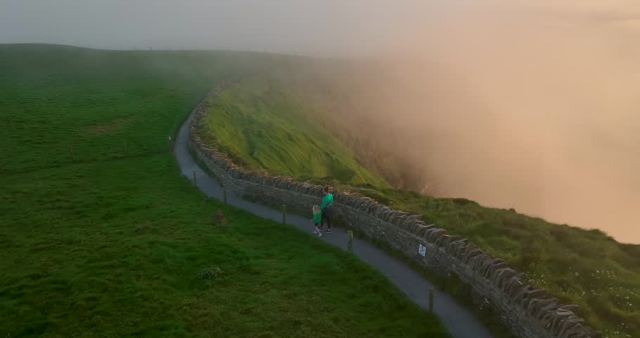 Tourists Admiring Cliffs of Moher View, County Clare, Ireland