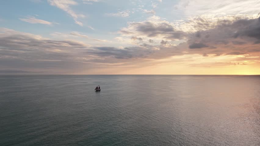 Sailboat Sunset with Cloudy Sky