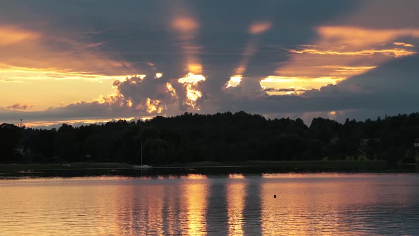 Stockholm, Sweden A finger-of-God sunset over Lake Malaren