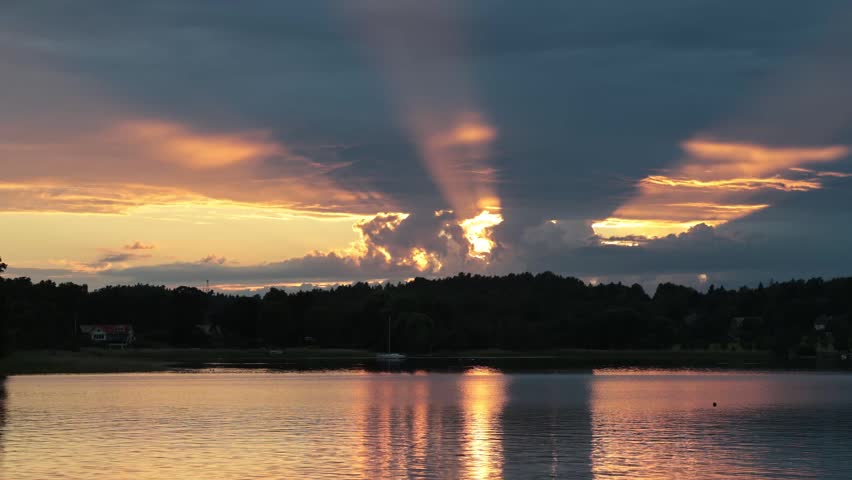 Stockholm, Sweden A finger-of-God sunset over Lake Malaren