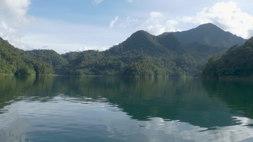 Serene afternoon footage of Lake Danao, one of the two crater lakes within the Twin Lakes system of Sibulan, Negros Oriental
