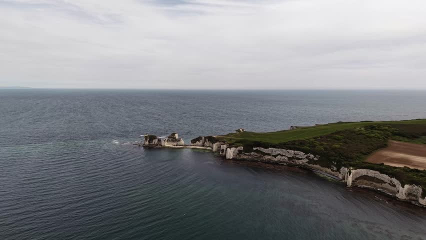 Drone shot circling above Old Harry Rocks in Swanage