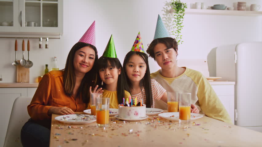 Happy Family Celebrating Birthday With Cake And Drinks At Home, Kids And Parents Together