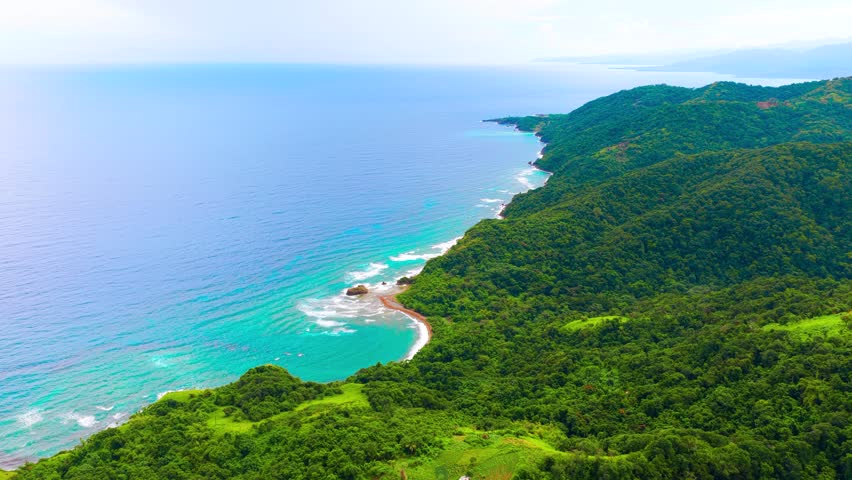 An aerial view of some beautiful coastline in Jamaica. Captured in 4k