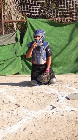 Boy in full catcher