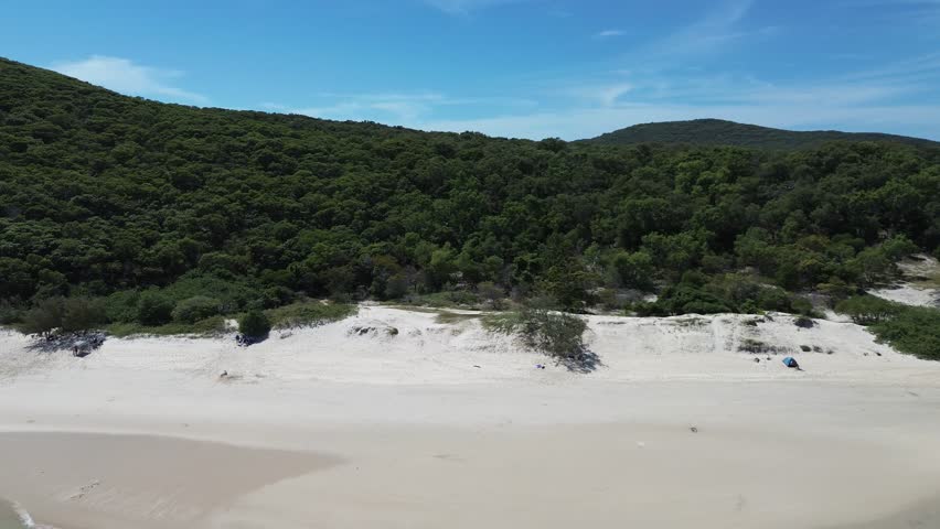 Aerial 4K drone footage of Keppel Island Queensland Australia. Tropical island beach and coral reef from above.