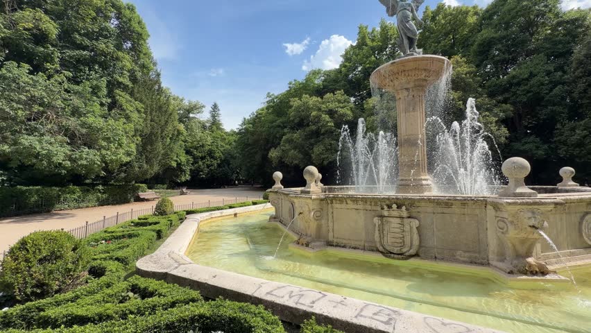 Beautiful stone fountain with bronze statue sculpture