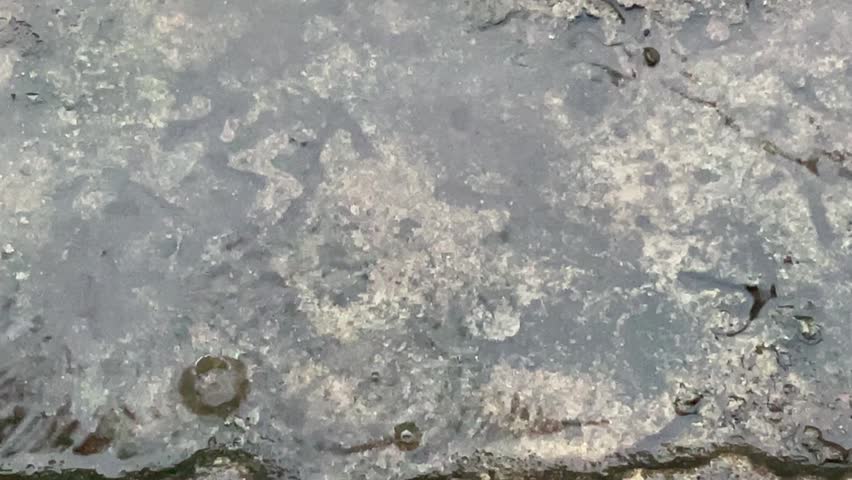 Background of raindrops outdoors in the late afternoon