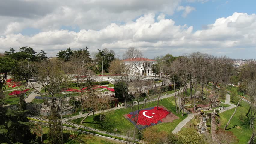 Aerial view of the Bosphorus with tulips; view of the Turkish flag; general aerial view of Istanbul