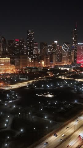 Night Chicago Skyline At Chicago In Illinois United States. Illuminated Downtown. City At Night Landscape. Chicago At Illinois United States. Chicago City District. City Skyline Scene.