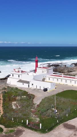 Shallow Cape Lighthouse At Cascais In District Of Lisbon Portugal. Beach Skyline. Lighthouse Landscape. Summer Travel. Shallow Cape Lighthouse At Cascais In District Of Lisbon Portugal.