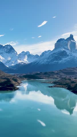 National Park Of Torres Del Paine In Puerto Natales Chile. Snowy Mountains. Glacier Landscape. Puerto Natales Chile. Summer Background. National Park At Torres Del Paine In Puerto Natales Chile.