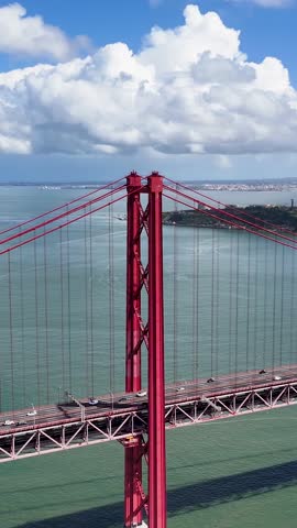 25 Of April Bridge At Lisbon In Lisbon District Portugal. Infrastructure Scenery. Road Trip Transportation. 25 Of April Bridge At Lisbon In Lisbon District Portugal. Famous Cable Stayed Bridge.