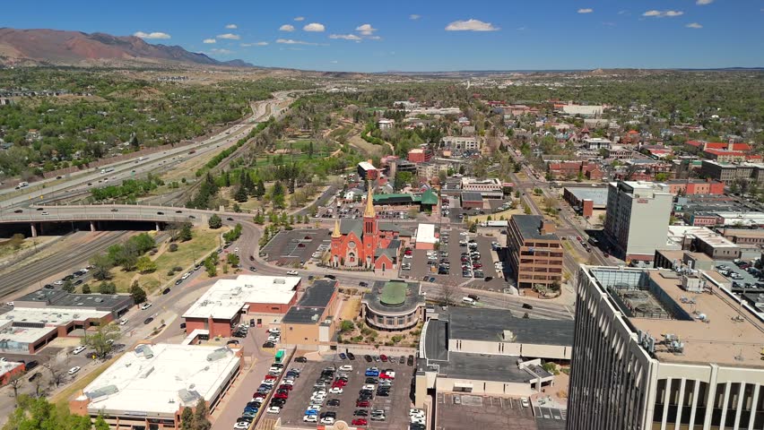 Drone View of Historic Red Brick Church with Twin Spires in Colorado Springs
