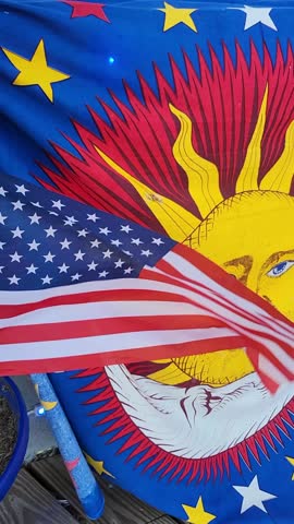 American flag and sun banner
