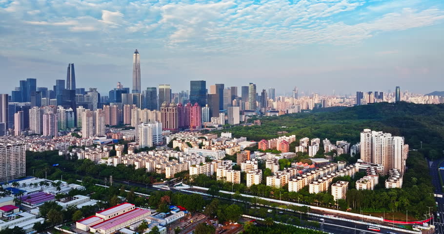Impressive cityscape of a modern financial district with skyscrapers and urban park in Shenzhen, China