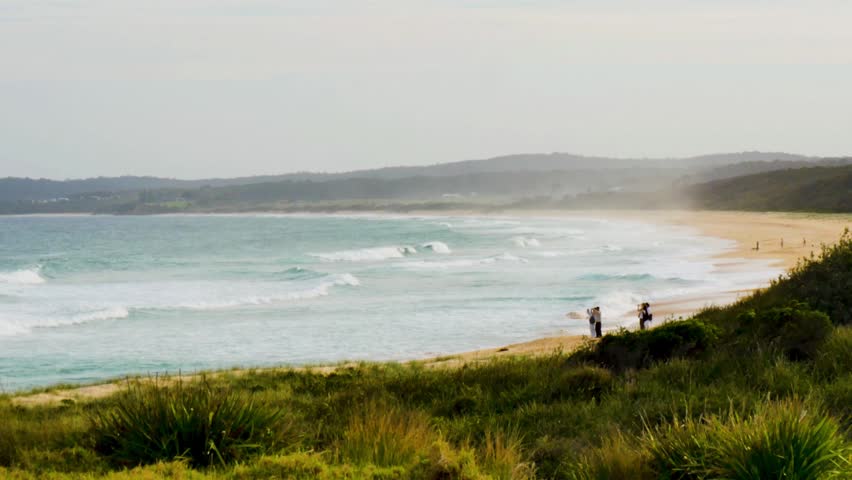 Tourists on the beach coastline