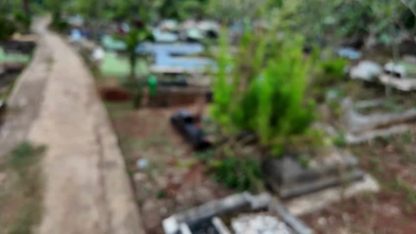 blurry old cemetery in the village