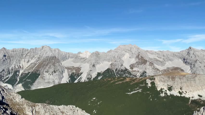 High angle panorama of the Nordkette mountain ridge and Inn Valley near Innsbruck Austria
