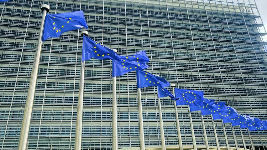 View on waving European Union flags.