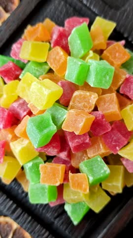 Candied fruit in colorful cubes as an ingredient for baked goods and sweets. Candied fruit