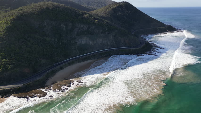 Aerial view of nature landscapes on Great Ocean Road Australia with mountains hills and scenic highway along the Southern Ocean in Victoria