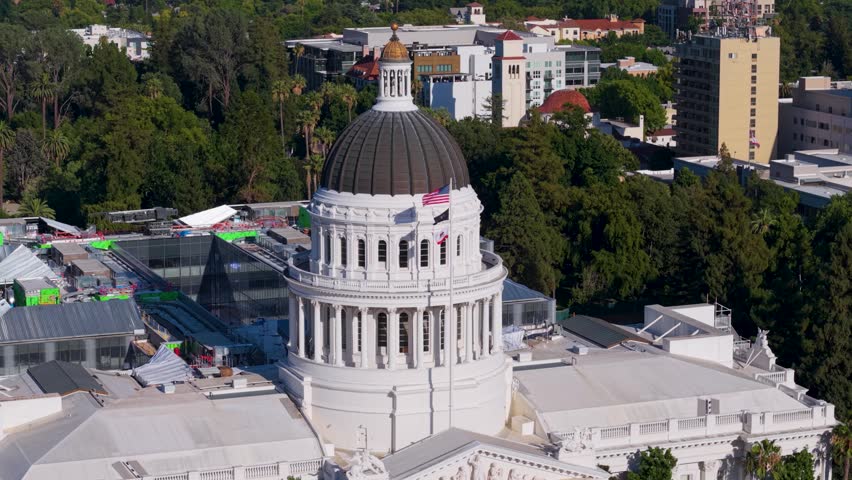 Observe the west side of the California State Capitol and the new annex being built to the east in Sacramento.