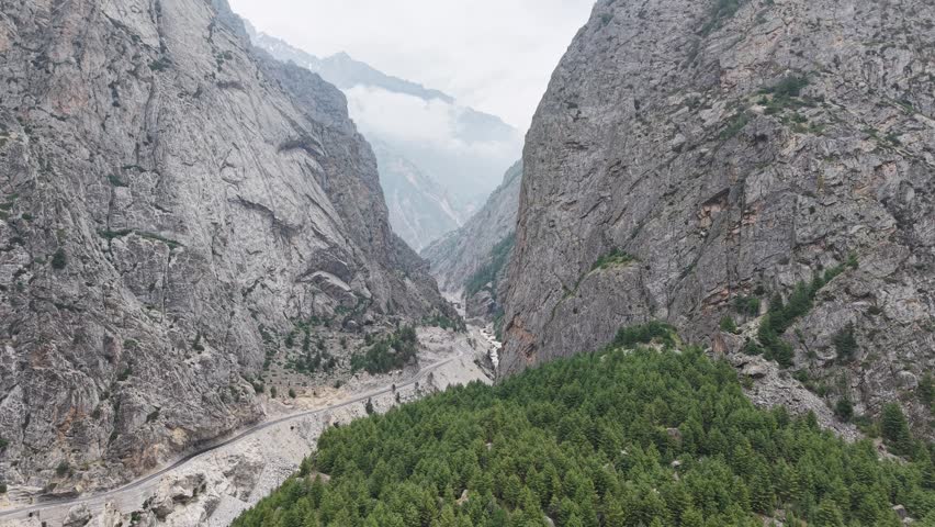 Aerial view of the rugged mountain landscape in Ladakhand uttarakhand India, captured on a clear sunny day.