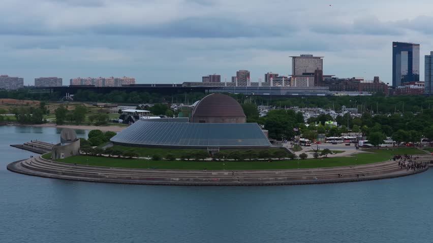 Adler Planetarium and Museum Campus in Chicago, Illinois featuring South Loop skyline, city architecture, Lake Michigan waterfront, Burnham Park