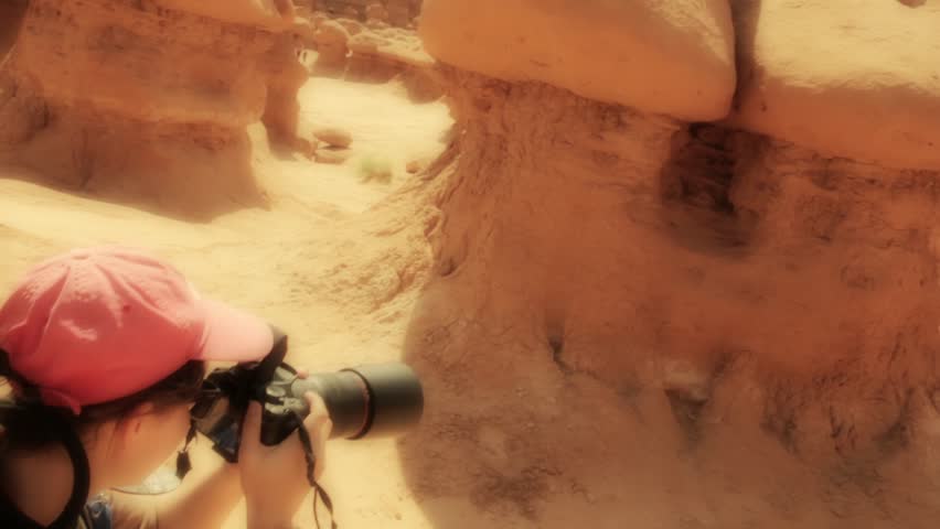 A photographer taking pictures in Goblin Valley State Park