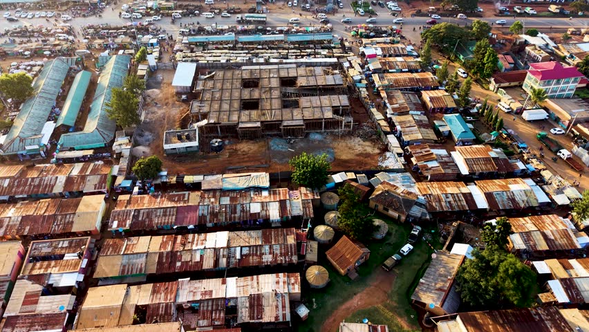 Houses of Kibera slums, roads in Soweto informal settlement nairobi kenya. Drone flying in the rural settlement of kenya slums
