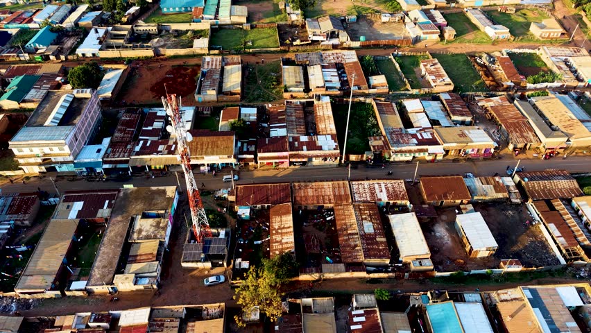 Houses of Kibera slums, roads in Soweto informal settlement nairobi kenya. Drone flying in the rural settlement of kenya slums