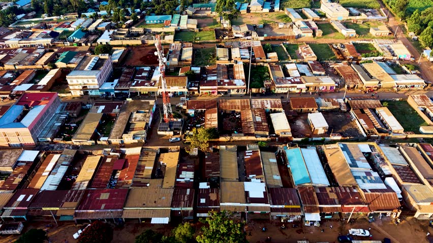 Houses of Kibera slums, roads in Soweto informal settlement nairobi kenya. Drone flying in the rural settlement of kenya slums