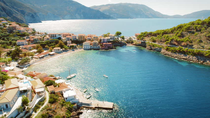 Seaside Asos village surrounded by mountains and blue sea on Kefalonia island