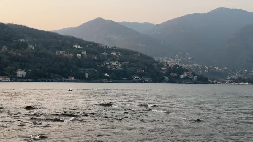 Panoramic view of Lake Como with mountain landscape in Lombardy, Italy