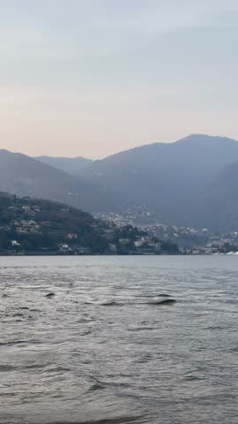Panoramic view of Lake Como with mountain landscape in Lombardy, Italy