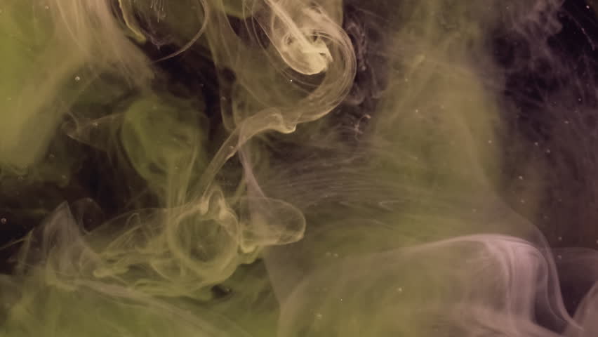 Ink splash. Atmospheric smoke. Defocused green purple color glitter water fume underwater vapor particles spreading on abstract art background.