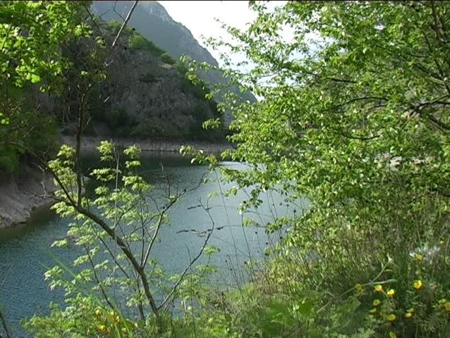 A view of a lake in a natural park.