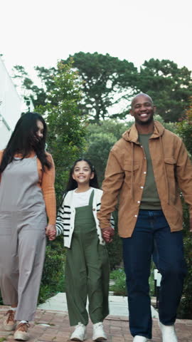 Love, walk or interracial family in park with holding hands, childcare or bonding on weekend break. Support, parents or girl outdoor with stroll, loving moment or fun activity in happy connection.