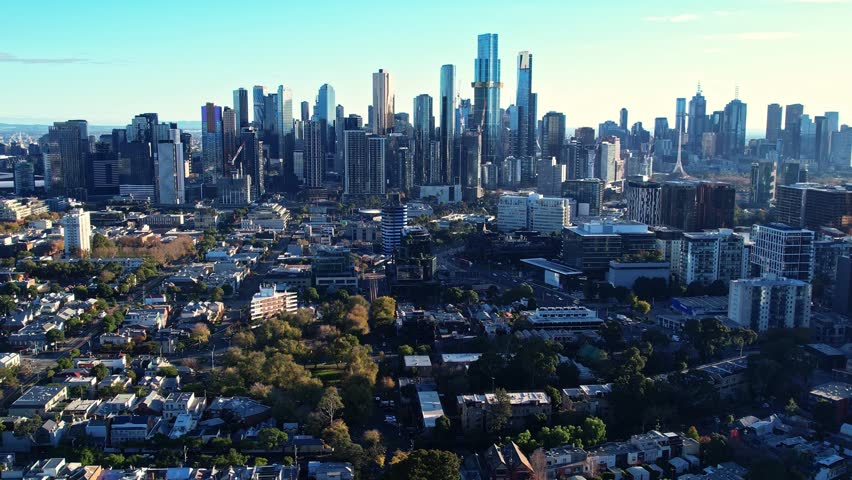 Sunrise view of Yarra river and Melbourne skyscrapers business office building with evening skyline in Victoria, Albert Park, Australia