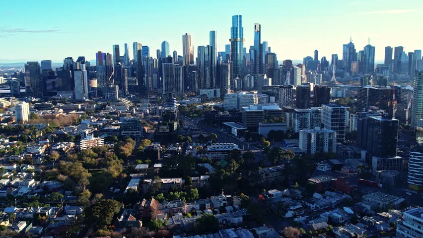 Sunrise view of Yarra river and Melbourne skyscrapers business office building with evening skyline in Victoria, Albert Park, Australia