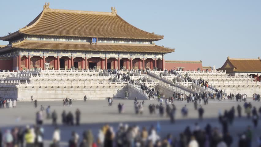 view of Main building Hall square of Forbidden City an ancient Chinese royal palace with grand main dragon stair, world famous historical building with crowded people