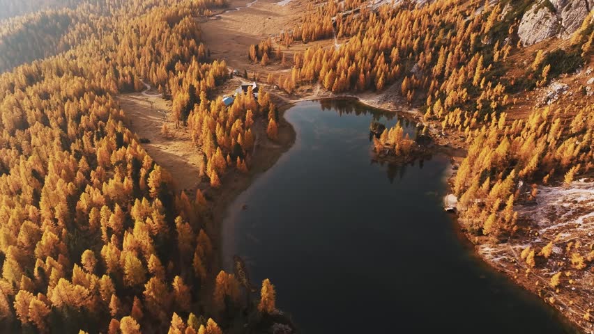 Lake Federa near the Croda da Lago mountain at autumn time, majestic landscape, raw nature.