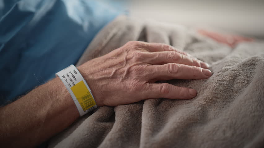 Hospital Ward: Portrait of Elderly Man Wearing Oxygen Mask Resting in Bed, Fully Recovering after Sickness and Successful Surgery. Old Man Remembering His Family, Friends, Happy Long Life
