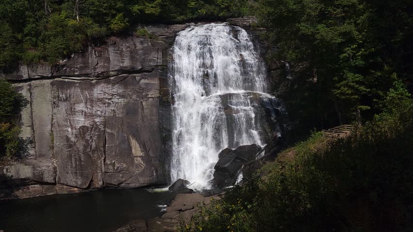 White water falling over the near vertical, 150-foot cliff to form Rainbow Falls near Gorges State Park, Nantahala National Forest, in Western North Carolina.